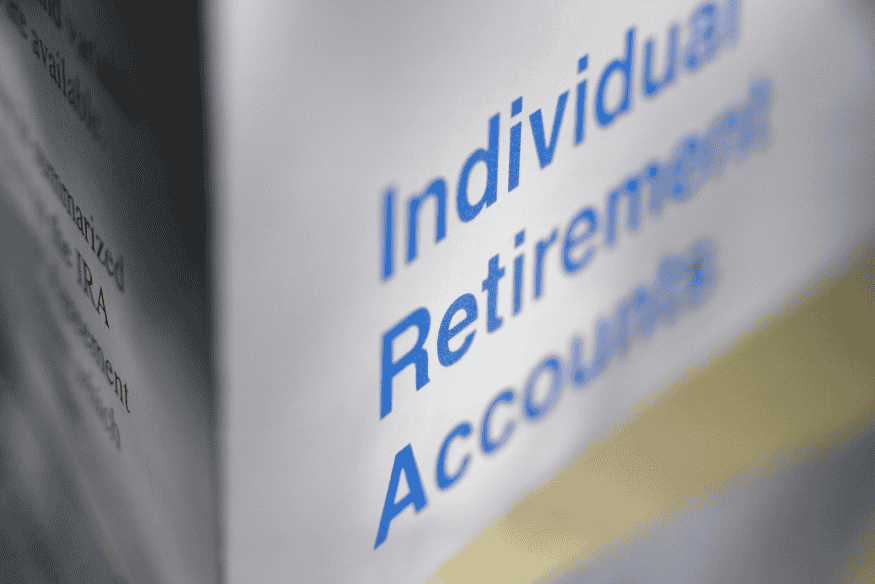Individual Retirement Account folder representing long-term investing in a beginner financial plan