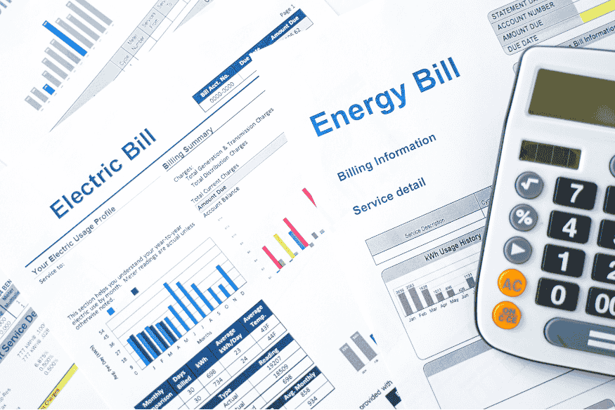 Electric and energy bills being calculated to find smart ways to cut recurring expenses