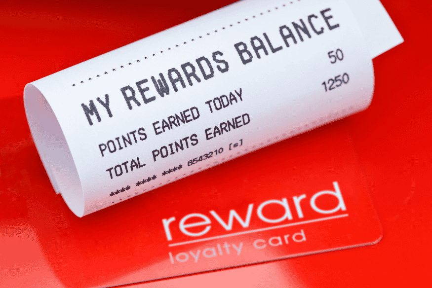 Receipt showing rewards points balance earned with a loyalty and travel credit card